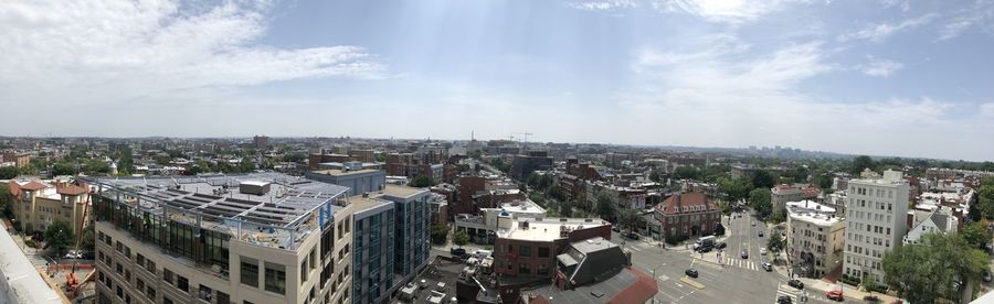 High angle view of road amidst buildings in city