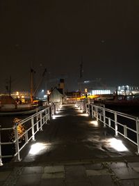 Illuminated street at night