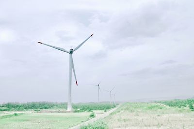 Windmill - power in nature against the blue sky along  the route 9 in japan 