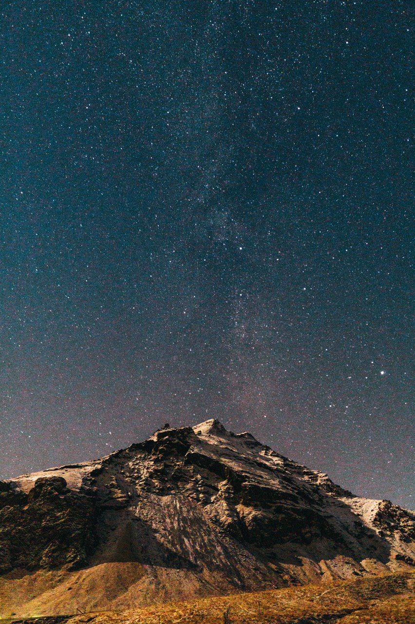 star, astronomy, space, scenics - nature, sky, night, galaxy, mountain, beauty in nature, landscape, environment, nature, science, milky way, astronomical object, tranquility, no people, tranquil scene, star field, land, space and astronomy, mountain range, constellation, idyllic, travel destinations, outdoors, non-urban scene, travel