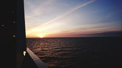 Scenic view of sea against sky at sunset