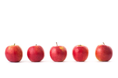 Close-up of apples against white background