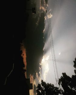 Low angle view of illuminated building against sky