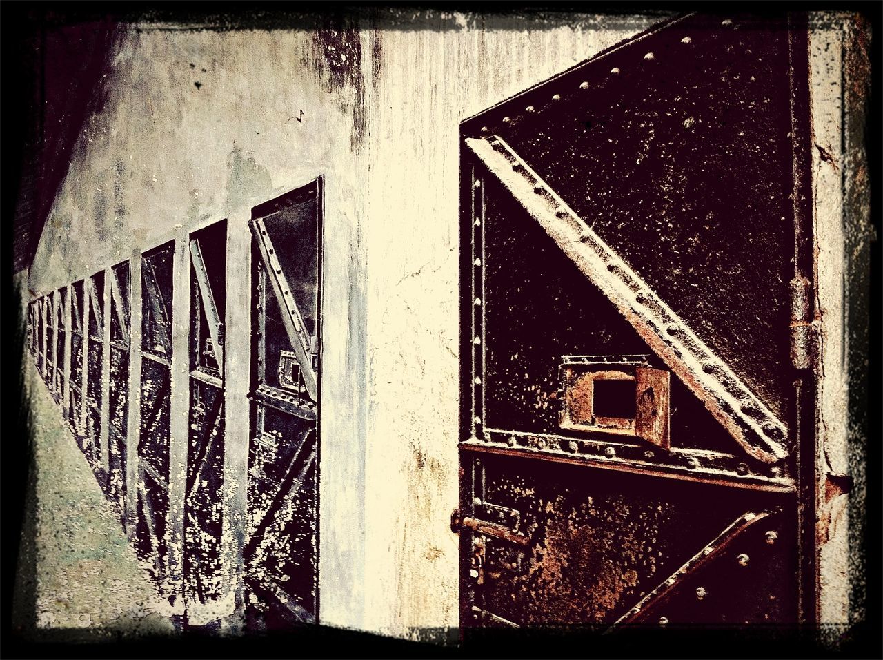 transfer print, auto post production filter, built structure, architecture, old, building exterior, metal, abandoned, weathered, damaged, indoors, rusty, obsolete, close-up, wood - material, deterioration, run-down, window, pattern, low angle view