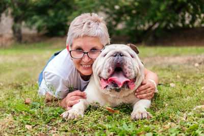 Portrait of dog on field