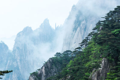 Panoramic view of waterfall against sky