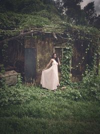 Woman standing in a forest