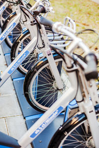 Close-up of bicycles parked on street