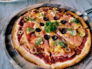 High angle view of pizza on table