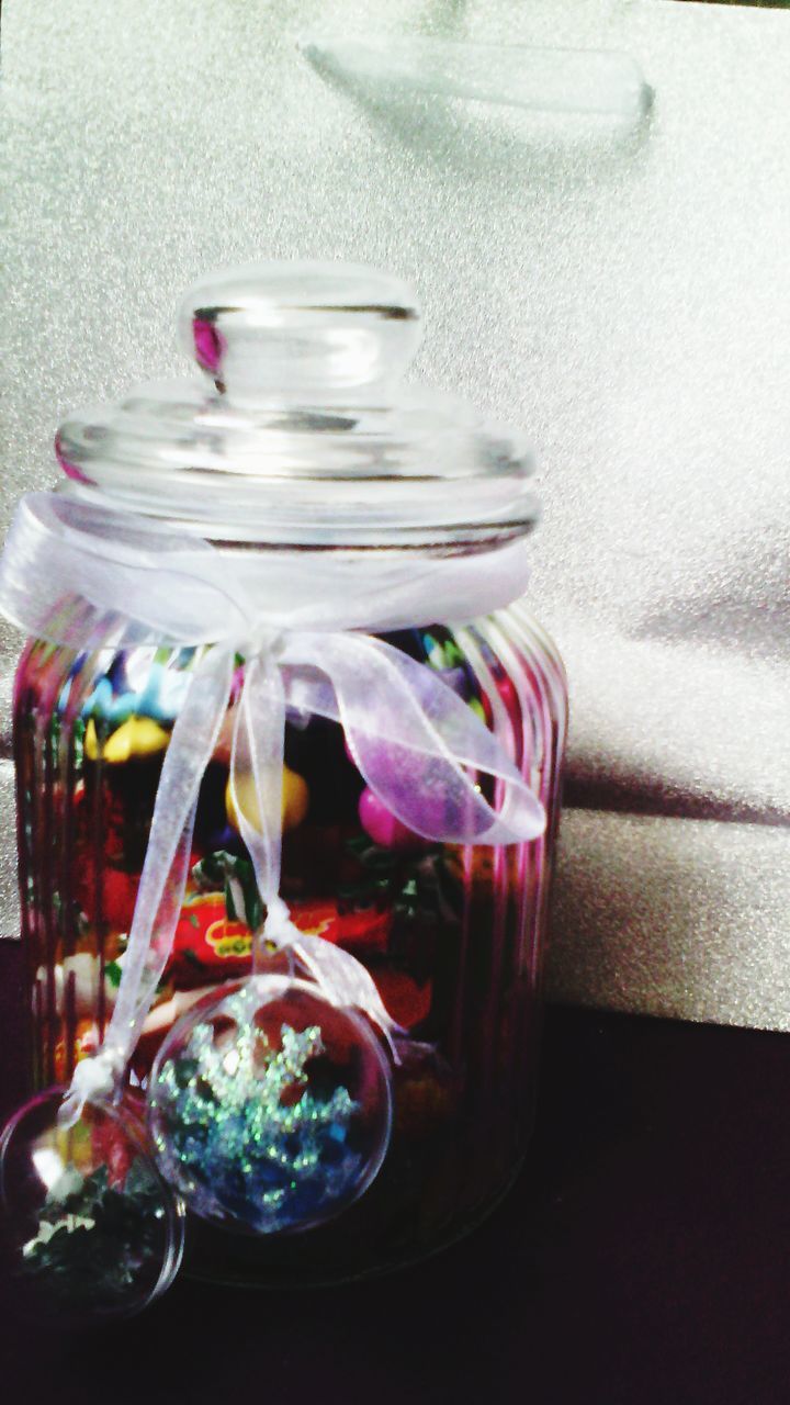 indoors, glass - material, table, food and drink, drinking glass, still life, freshness, transparent, drink, close-up, glass, refreshment, jar, wineglass, vase, water, fragility, no people, focus on foreground, drinking straw