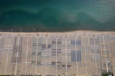 Aerial view of the equipped beach of viareggio tuscany photographed in the late afternoon