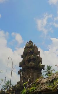 Low angle view of historic building against cloudy sky