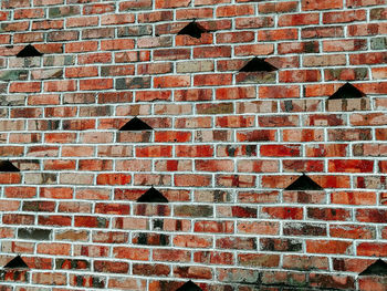 Low angle view of brick wall in outdoor