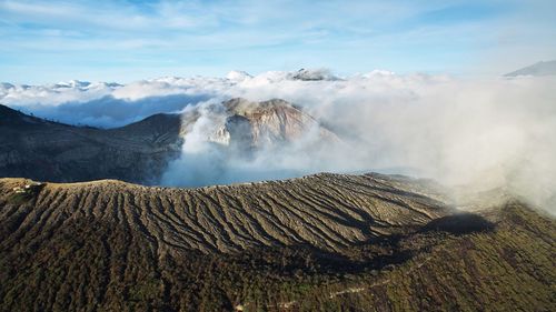 Panoramic view of volcanic landscape against sky