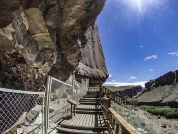 Footbridge leading towards mountain