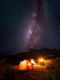 Tent against sky at night