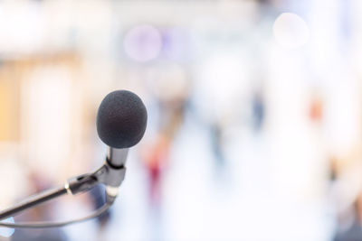 Close-up of microphone, public speaking or relations with copy space concept