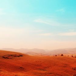 Scenic view of desert against sky