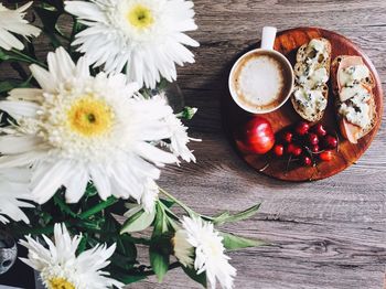 High angle view of flowers in bowl on table