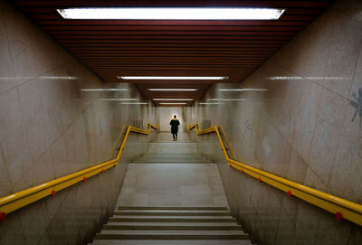 High angle view of people walking in subway