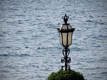 High angle view of electric lamp on rock