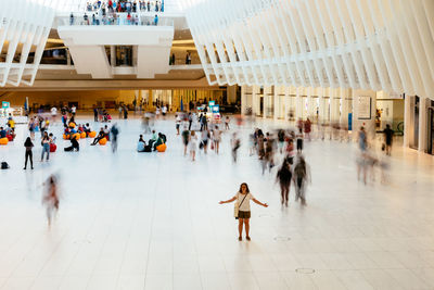 High angle view of people walking in city