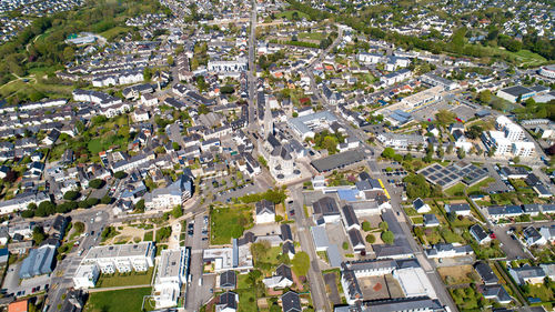 High angle view of street amidst buildings in town