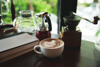 Close-up of coffee cup on table