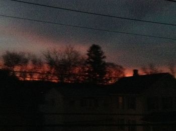 Built structure against sky at sunset