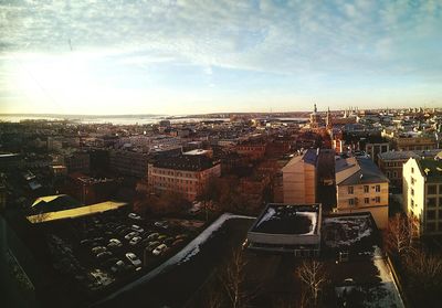 Aerial view of city at sunset