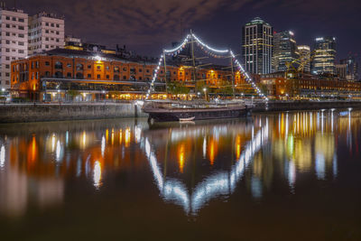 Illuminated buildings in city at night