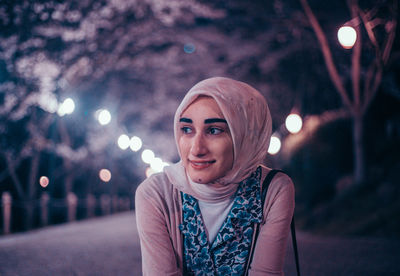 Portrait of smiling young woman