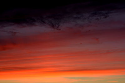 Scenic view of dramatic sky during sunset