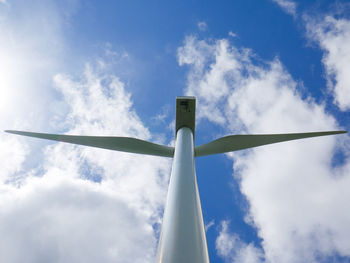 Low angle view of wind turbine against sky