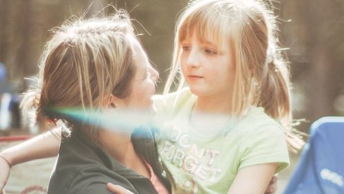 Portrait of mother with daughter