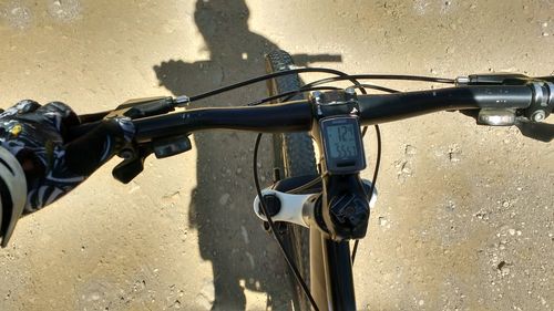 Close-up of bicycle on road