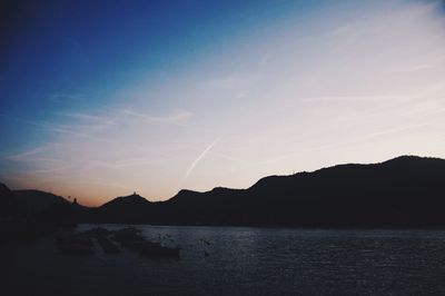 Scenic view of mountains at sunset