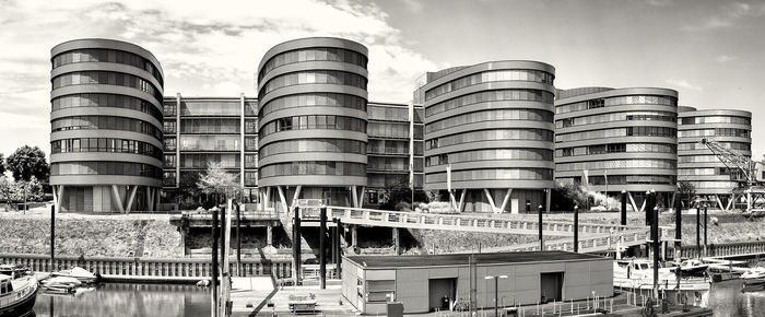 Low angle view of buildings in city against sky