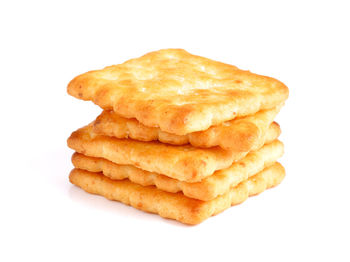 Close-up of bread against white background