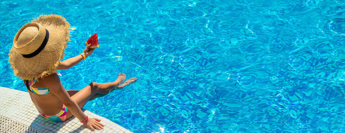 High angle view of woman in swimming pool