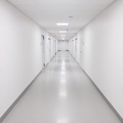 Illuminated corridor of building