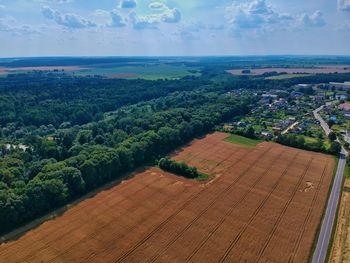 High angle view of trees on field against sky