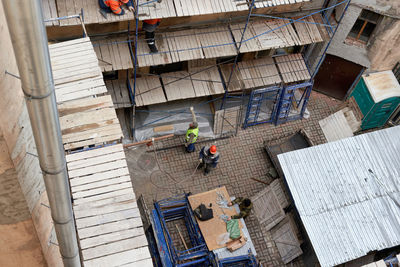 High angle view of people working at construction site