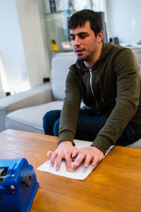 Blind man reading braille