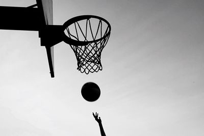 Low angle view of basketball hoop against sky