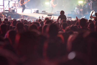 People enjoying at music concert