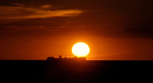 Scenic view of sunset over sea