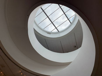 Low angle view of spiral staircase in building