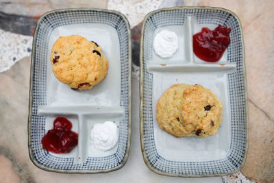 High angle view of cookies in plate on table