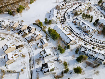 High angle view of buildings in city during winter